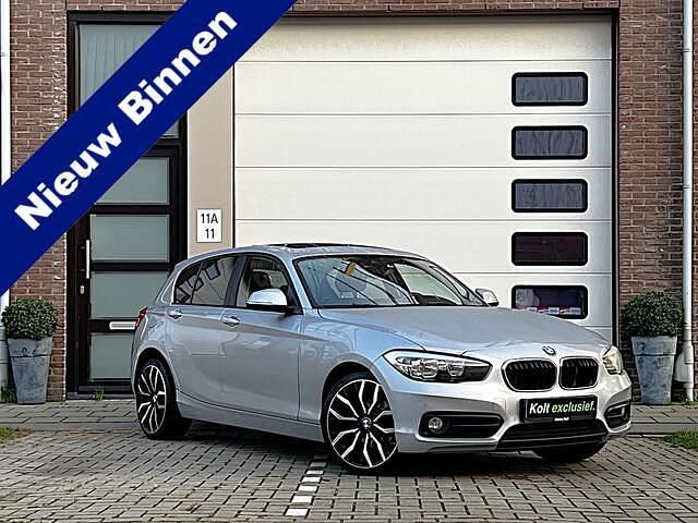 Grijs (metallic) Occasion 2016 BMW 116 Sport Line Hatchback | € 8.990 (Goede deal) - Afbeelding 1/4