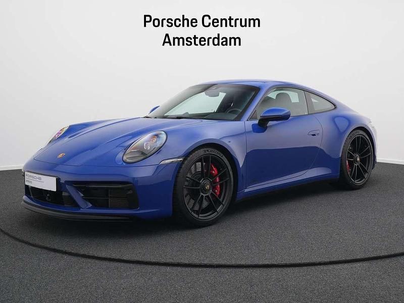 Paint to sample: fjord blue Gebruikt 2023 Porsche 911 Carrera GTS Coupé | € 189.950 (Super prijs) - Afbeelding 1/4