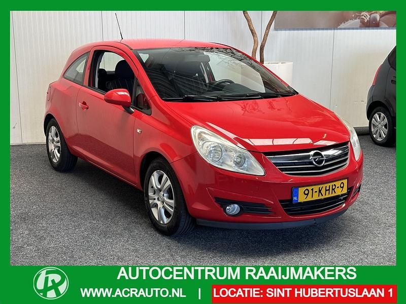 Rood Gebruikt 2009 Opel Corsa Enjoy Hatchback | € 3.235 (Eerlijke prijs) - Afbeelding 1/4