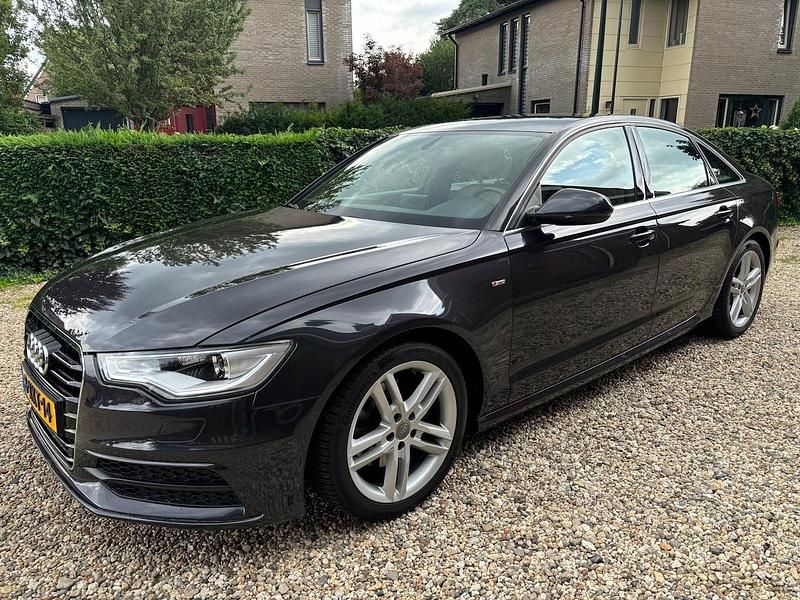 Grijs Gebruikt 2014 Audi A6 Sport Sedan | € 15.997 - Afbeelding 1/4