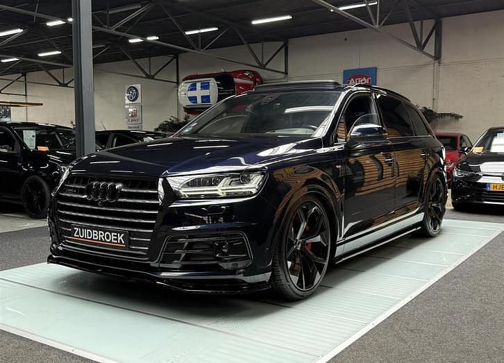 Blauw, metallic lak Gebruikt 2016 Audi Q7 S-Line SUV | € 44.999 - Afbeelding 1/4