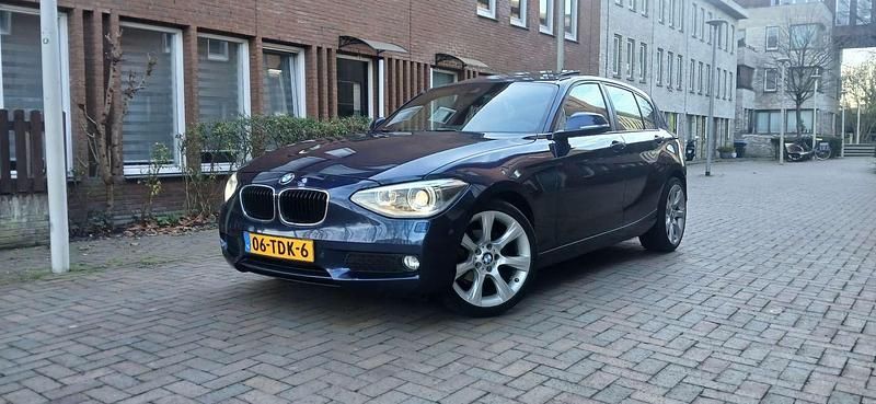 Blauw Gebruikt 2012 BMW 116 Hatchback | € 5.249 (Eerlijke prijs) - Afbeelding 1/4