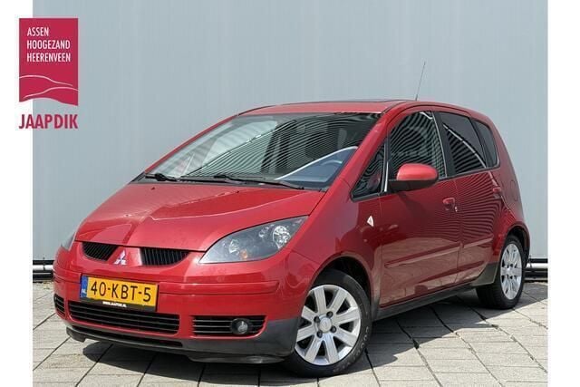 Rood Gebruikt 2009 Mitsubishi Colt Hatchback | € 3.744 (Eerlijke prijs) - Afbeelding 1/4