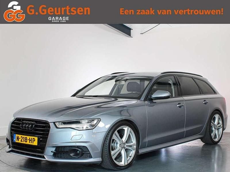 Grijs (metallic) Gebruikt 2017 Audi A6 S-Line Stationwagen | € 20.995 (Eerlijke prijs) - Afbeelding 1/4