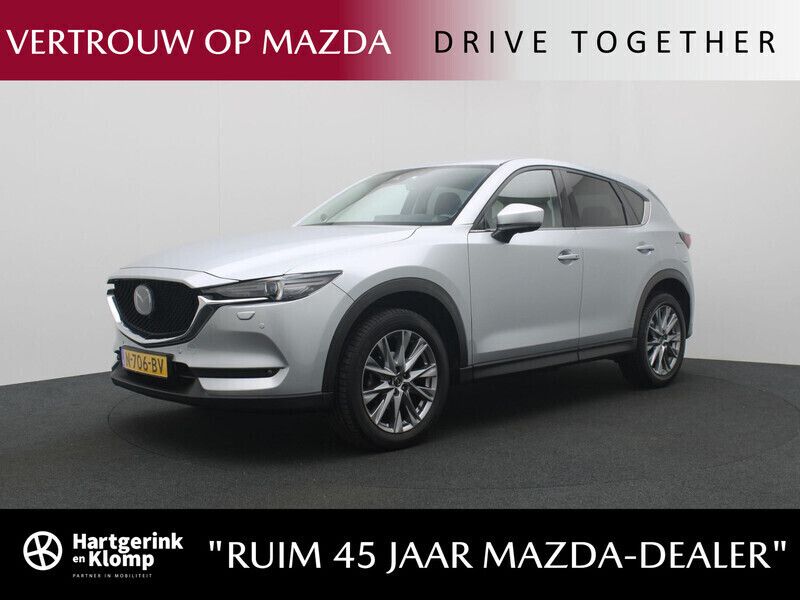 Grijs Gebruikt 2021 Mazda CX-5 Luxury SUV | € 34.950 (Eerlijke prijs) - Afbeelding 1/4