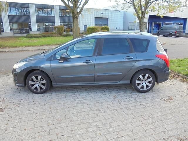 Grijs Gebruikt 2010 Peugeot 308 Stationwagen | € 749 (Super prijs) - Afbeelding 1/4