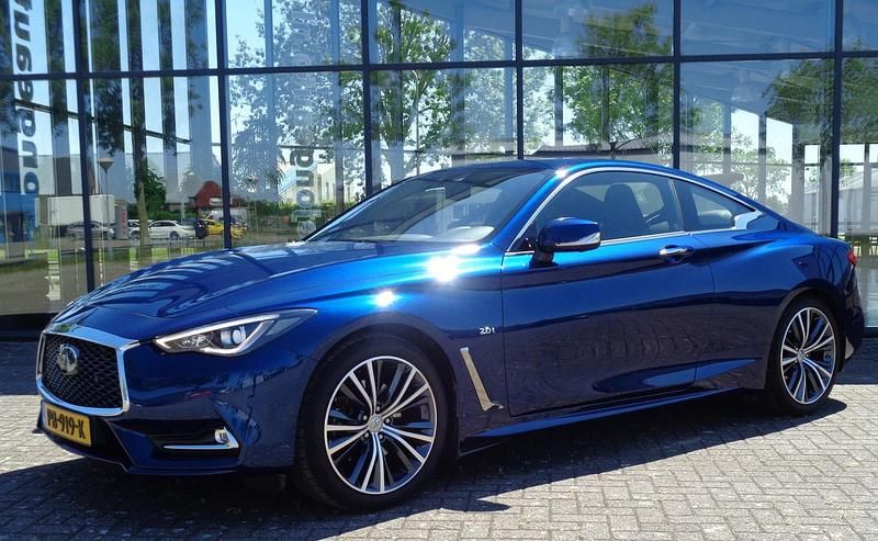 Blauw (metallic) Gebruikt 2017 Infiniti Q60 Sport Tech Coupé | € 29.950 - Afbeelding 1/4