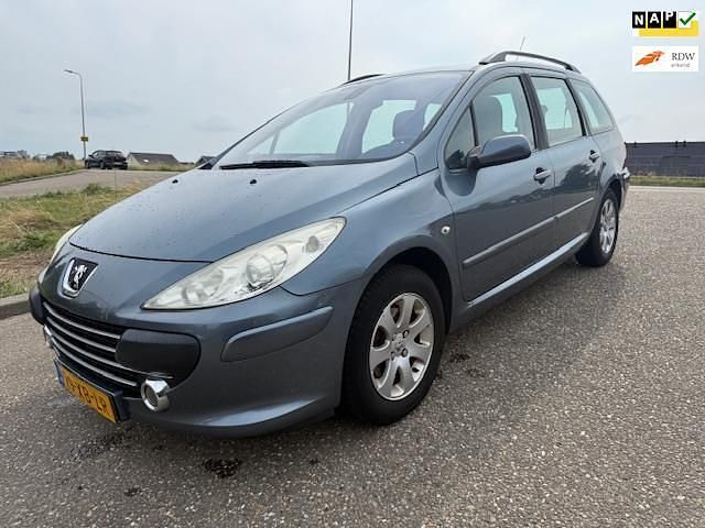 Grijs Gebruikt 2007 Peugeot 307 Premium Stationwagen | € 2.250 (Eerlijke prijs) - Afbeelding 1/4