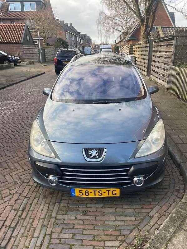 Zilver Occasion 2007 Peugeot 307 Premium Stationwagen | € 1.250 (Eerlijke prijs) - Afbeelding 1/4