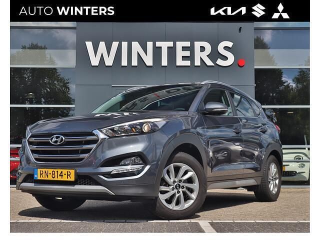 Grijs Gebruikt 2018 Hyundai Tucson Comfort SUV | € 18.945 (Eerlijke prijs) - Afbeelding 1/4