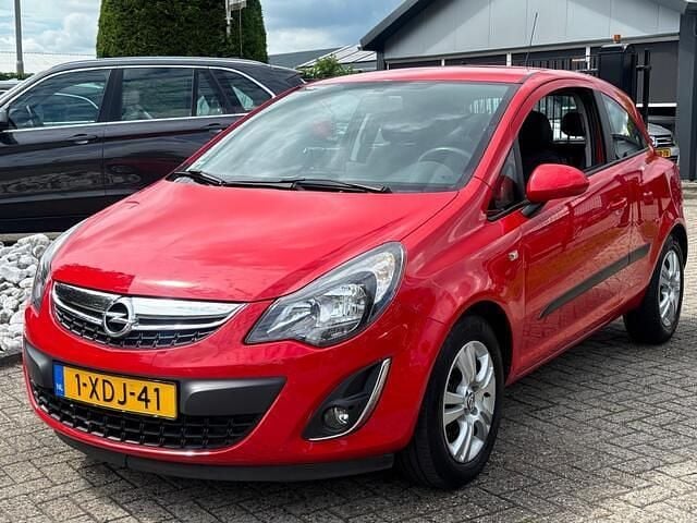 Rood Gebruikt 2014 Opel Corsa Hatchback | € 6.950 (Eerlijke prijs) - Afbeelding 1/4