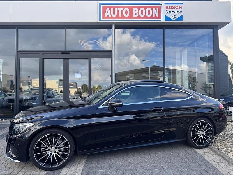 Zwart Gebruikt 2016 Mercedes C180 AMG Coupé | € 21.950 (Eerlijke prijs) - Afbeelding 1/4