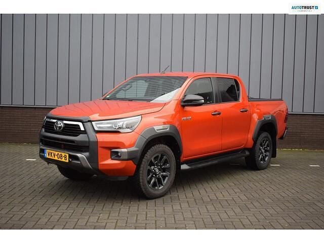 Oranje Gebruikt 2021 Toyota HiLux Pickup | € 41.945 (Super prijs) - Afbeelding 1/4