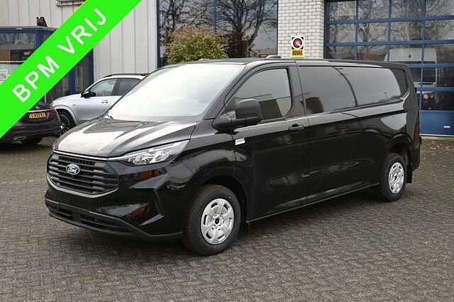 Zwart (metallic) Gebruikt 2024 Ford Transit Custom Trend Van | € 35.950 (Eerlijke prijs) - Afbeelding 1/4