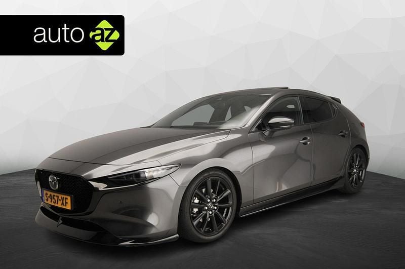 Grijs Gebruikt 2023 Mazda 3 Luxury Hatchback | € 26.900 (Eerlijke prijs) - Afbeelding 1/4