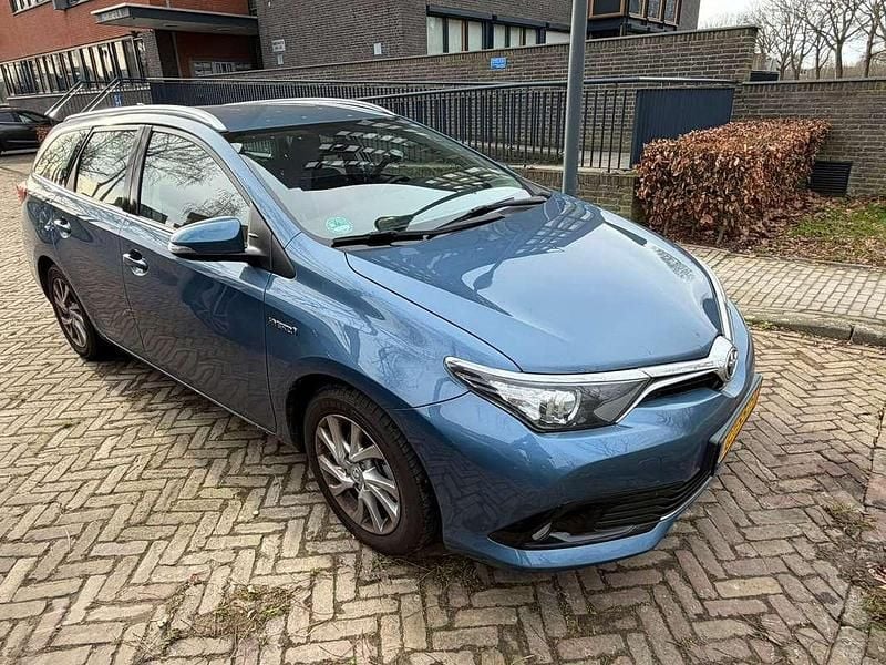 Blauw Occasion 2015 Toyota Auris Hybrid Stationwagen | € 14.500 (Eerlijke prijs) - Afbeelding 1/4
