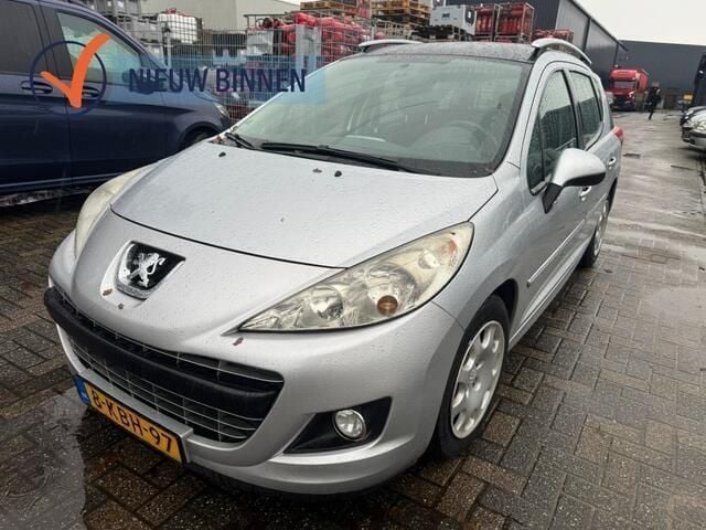 Grijs Gebruikt 2012 Peugeot 207 Stationwagen | € 2.299 - Afbeelding 1/4