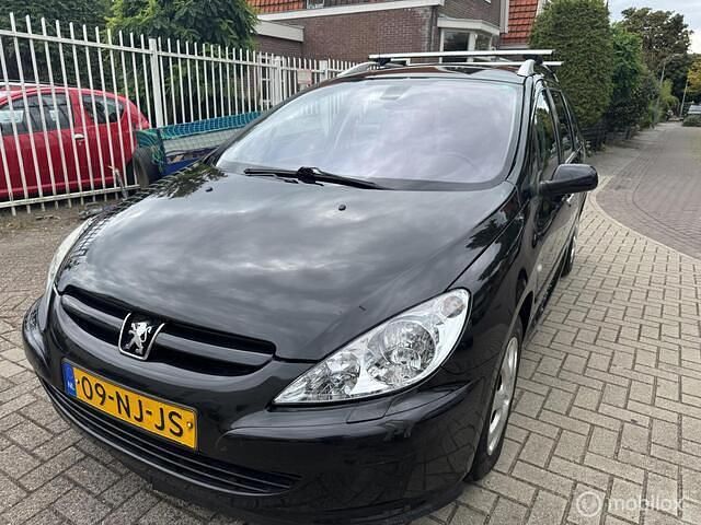 Zwart Gebruikt 2003 Peugeot 307 Stationwagen | € 2.250 (Iets duurder) - Afbeelding 1/4