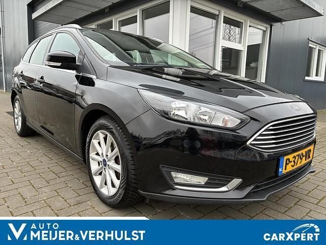 Zwart (metallic) Occasion 2016 Ford Focus Titanium Stationwagen | € 4.999 (Goede deal) - Afbeelding 1/4