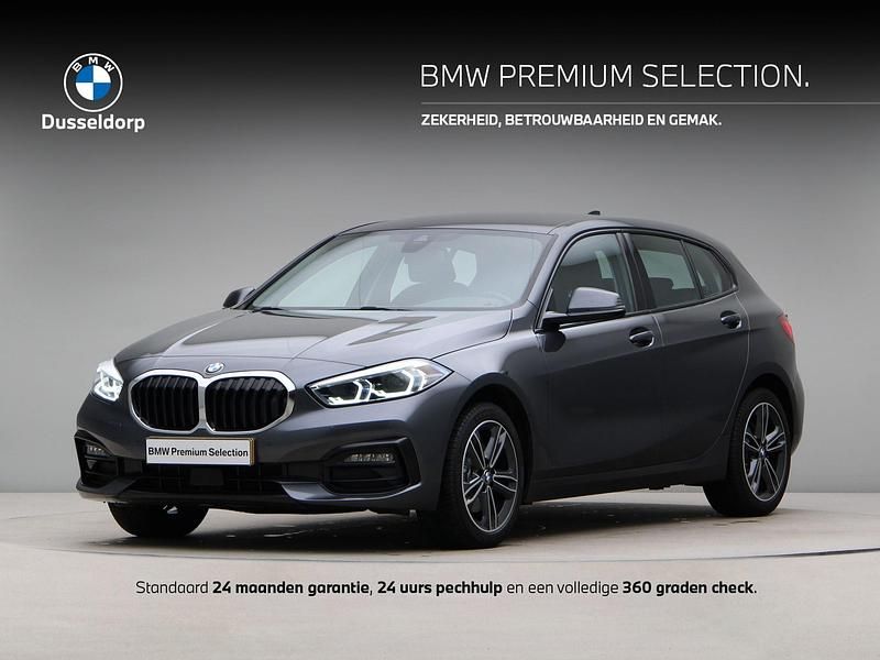 Grijs Gebruikt 2021 BMW 118 Sport Line Hatchback | € 23.250 (Goede deal) - Afbeelding 1/4