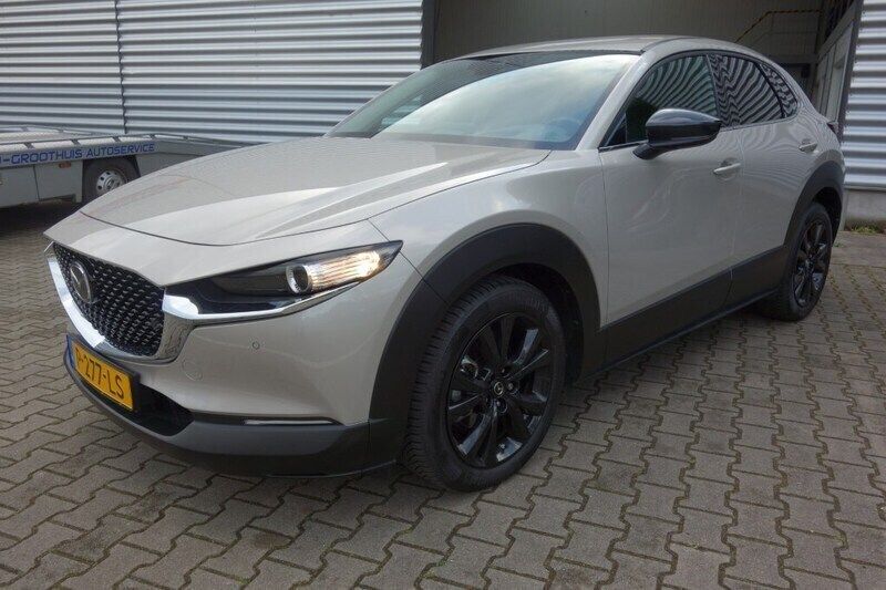 Grijs Gebruikt 2022 Mazda CX-30 Sportive SUV | € 26.700 (Goede deal) - Afbeelding 1/4