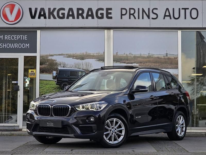 Bruin Occasion 2016 BMW X1 Executive SUV | € 19.400 (Goede deal) - Afbeelding 1/4