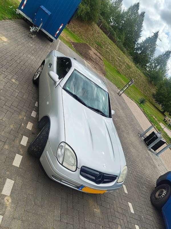 Grijs Gebruikt 1997 Mercedes SLK200 Cabriolet | € 1.250 (Eerlijke prijs) - Afbeelding 1/4