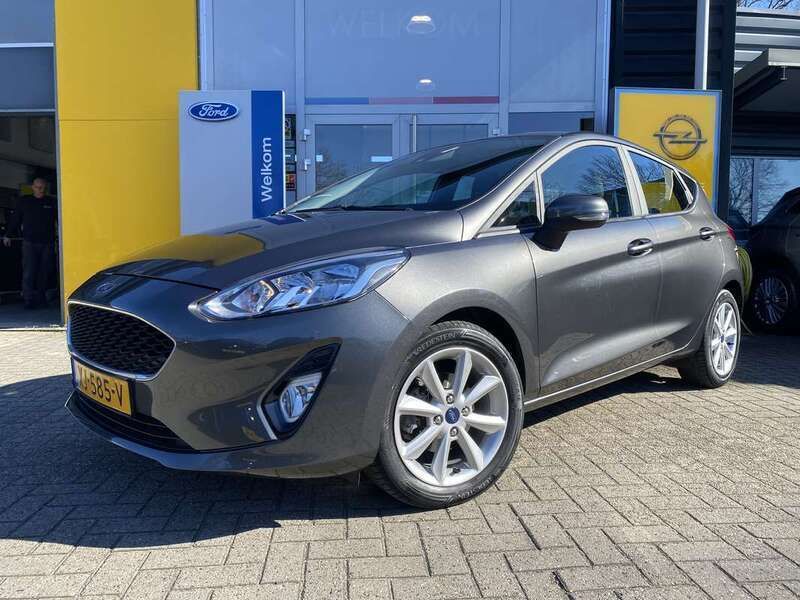 Grijs, metallic lak Gebruikt 2019 Ford Fiesta Trend Hatchback | € 12.800 (Eerlijke prijs) - Afbeelding 1/4