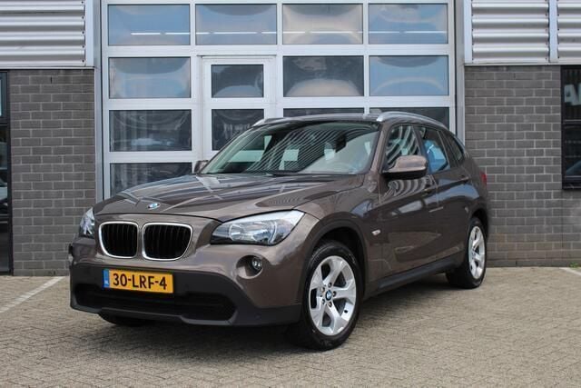 Bruin Gebruikt 2010 BMW X1 Executive SUV | € 10.950 (Iets duurder) - Afbeelding 1/4