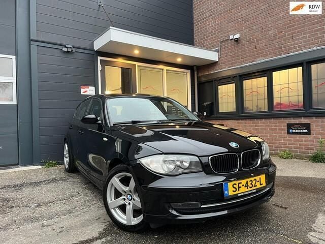 Zwart Gebruikt 2009 BMW 116 Hatchback | € 5.999 (Iets duurder) - Afbeelding 1/4