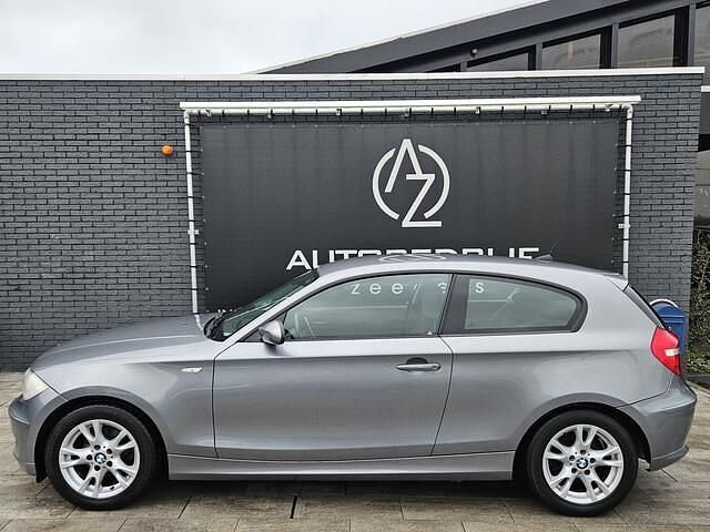 Grijs Gebruikt 2009 BMW 116 Sport Line Hatchback | € 3.950 (Eerlijke prijs) - Afbeelding 1/4