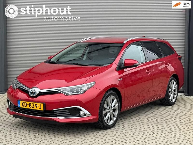 Rood Occasion 2016 Toyota Auris Executive Stationwagen | € 10.950 (Eerlijke prijs) - Afbeelding 1/4