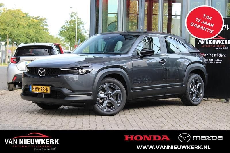 Machine grey (grijs metallic) Gebruikt 2025 Mazda MX30 Exclusive-Line SUV | € 29.400 (Eerlijke prijs) - Afbeelding 1/4
