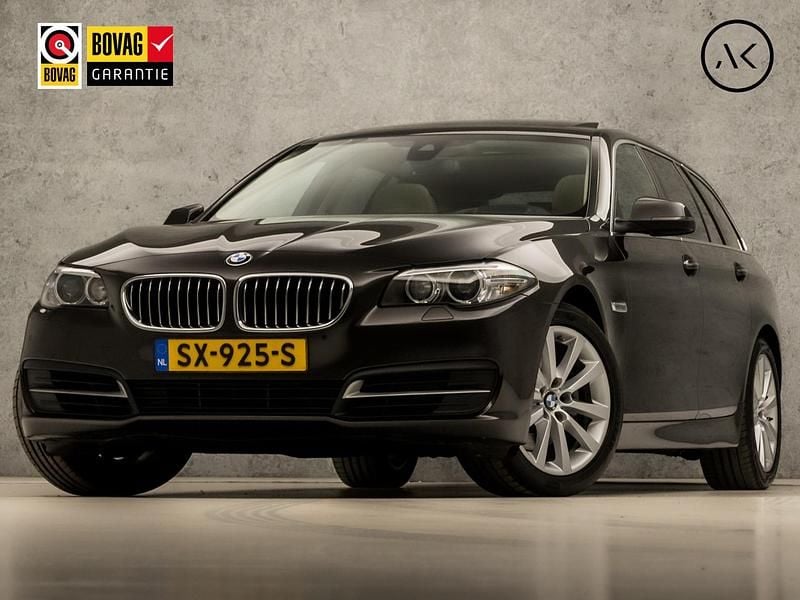 Bruin Gebruikt 2015 BMW 520 Executive Stationwagen | € 14.445 (Goede deal) - Afbeelding 1/4