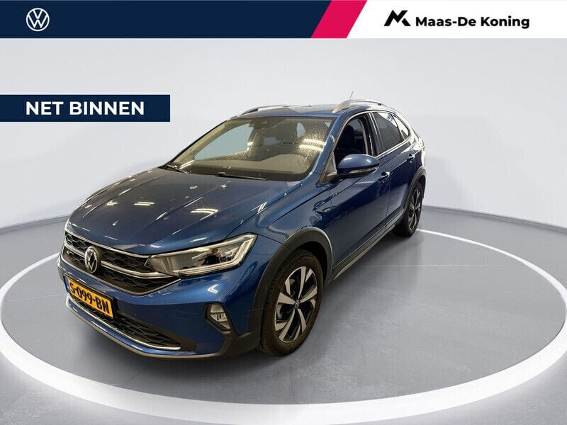 Blauw Gebruikt 2023 VW Taigo Style SUV | € 25.940 (Goede deal) - Afbeelding 1/4