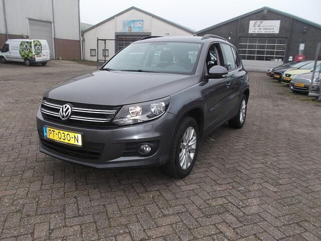 Grijs (metallic) Occasion 2011 VW Tiguan Sport SUV | € 8.950 (Eerlijke prijs) - Afbeelding 1/4