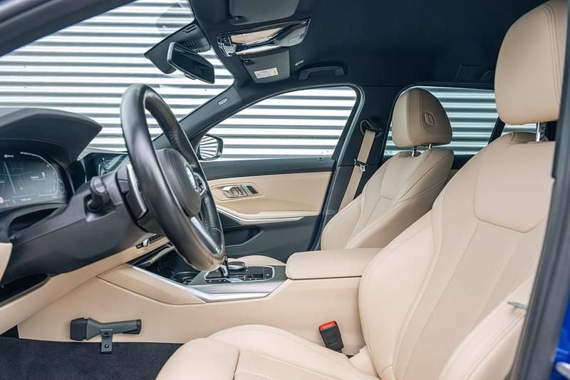 Occasion BMW 330e Executive 292 PK (214 kW) 2022 Blauw Stationwagen