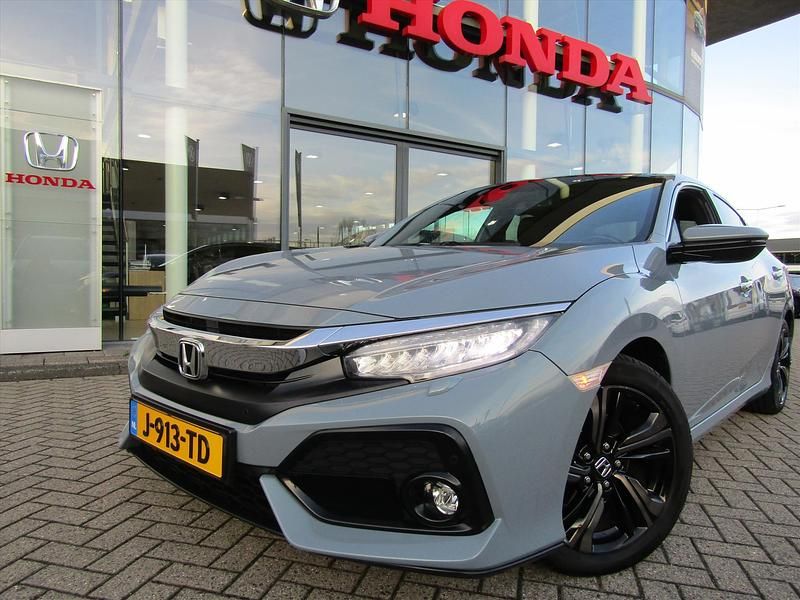 Grijs Occasion 2020 Honda Civic Prestige Hatchback | € 17.950 - Afbeelding 1/4