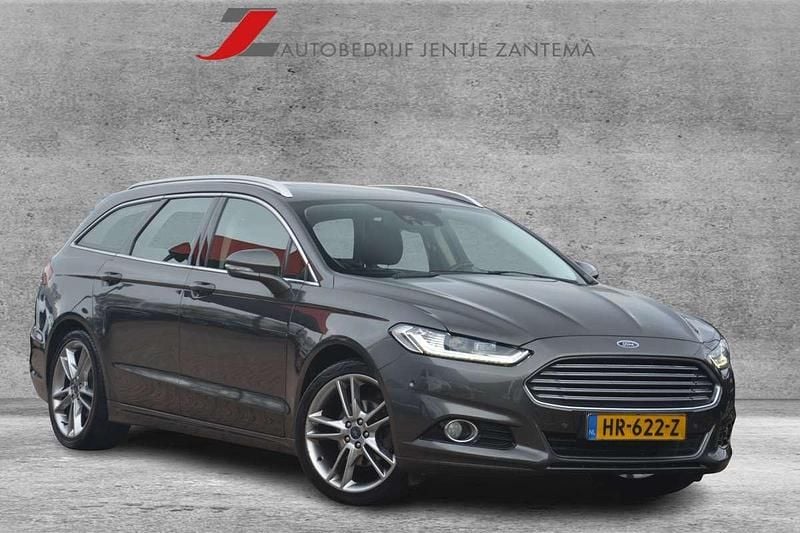 Grijs (metallic) Occasion 2016 Ford Mondeo Titanium Stationwagen | € 12.999 (Duur) - Afbeelding 1/4