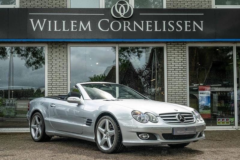 Grijs, metallic lak Gebruikt 2006 Mercedes SL500 Cabriolet | € 44.950 - Afbeelding 1/4