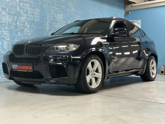 Blauw, metallic lak Gebruikt 2012 BMW X6 M Executive SUV | € 39.995 - Afbeelding 1/4