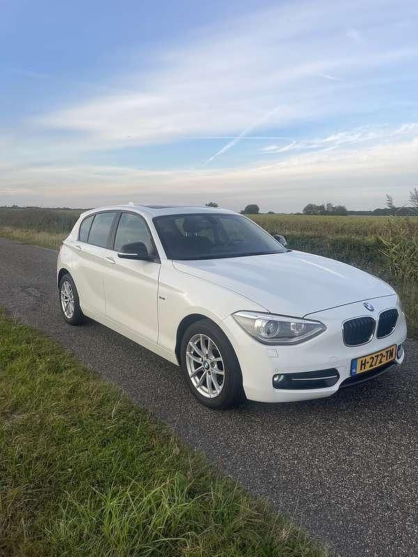 Wit Gebruikt 2013 BMW 116 Hatchback | € 9.495 (Eerlijke prijs) - Afbeelding 1/4