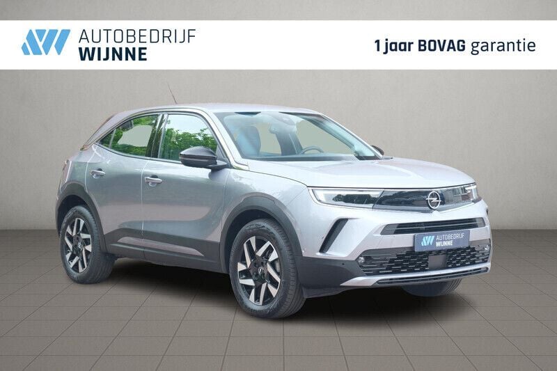 Grijs Gebruikt 2023 Opel Mokka Elegance SUV | € 21.950 (Eerlijke prijs) - Afbeelding 1/4