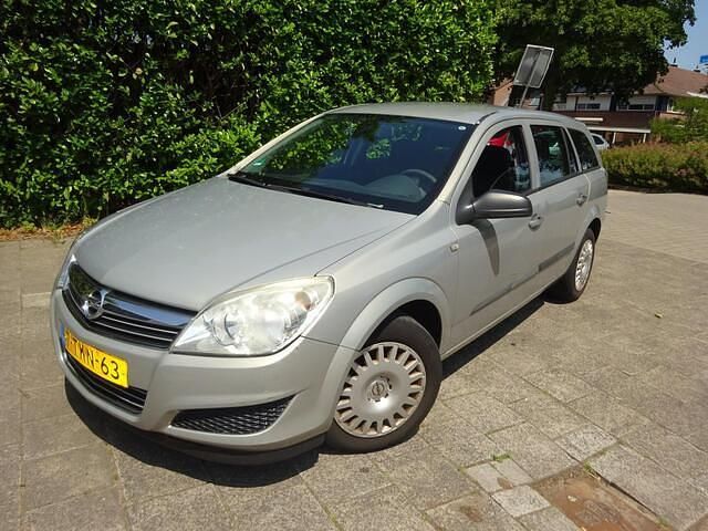 Grijs Gebruikt 2007 Opel Astra Essentia Stationwagen | € 1.250 (Goede deal) - Afbeelding 1/4