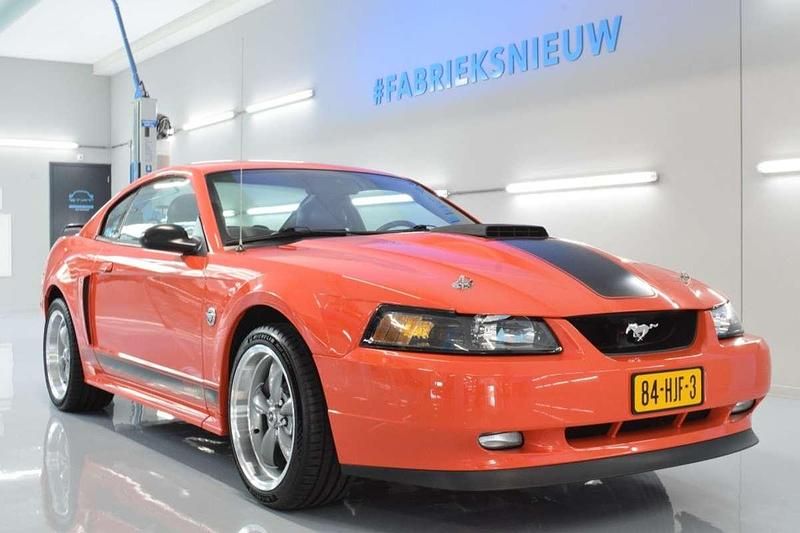 Oranje Gebruikt 2004 Ford Mustang Mach 1 Coupé | € 34.950 - Afbeelding 1/4