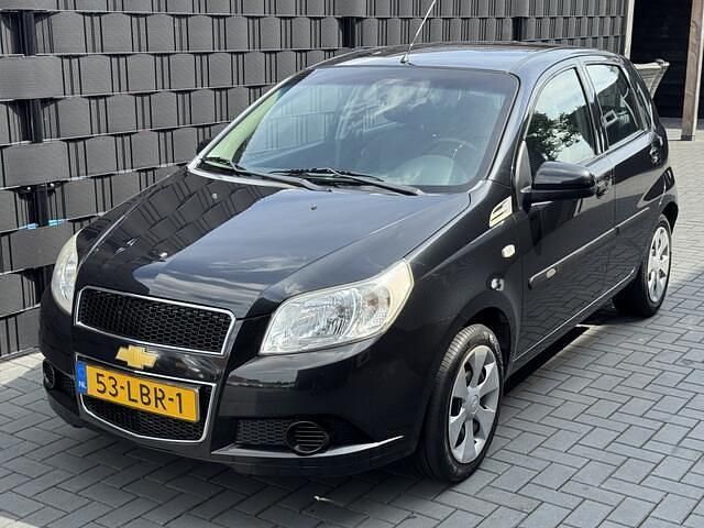 Zwart Gebruikt 2010 Chevrolet Aveo LS Hatchback | € 2.450 (Iets duurder) - Afbeelding 1/4