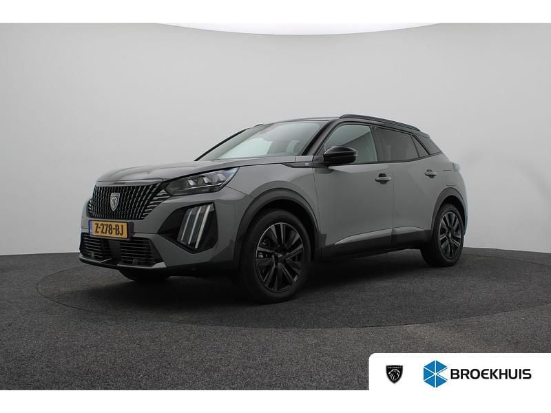 Grijs Gebruikt 2024 Peugeot e-2008 GTi SUV | € 27.395 (Eerlijke prijs) - Afbeelding 1/4