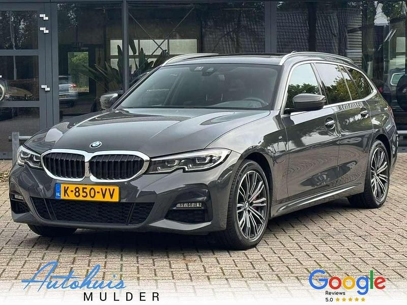 Grijs Gebruikt 2021 BMW 330e Executive Stationwagen | € 29.845 (Iets duurder) - Afbeelding 1/4
