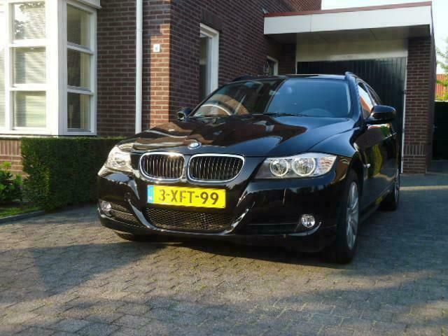 Zwart Gebruikt 2011 BMW 318 Luxury Line Stationwagen | € 17.890 - Afbeelding 1/4