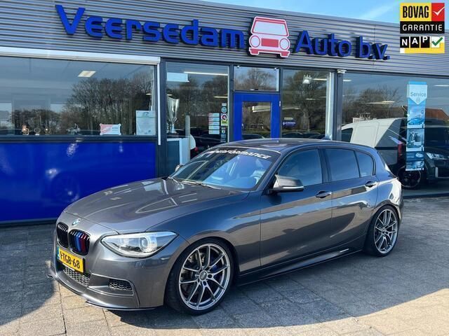 Grijs, metallic lak Gebruikt 2014 BMW M135 Executive Hatchback | € 19.990 - Afbeelding 1/4